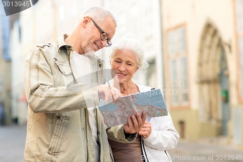 Image of senior couple on city street