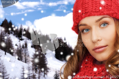 Image of close up of young woman in winter clothes