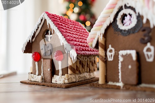 Image of closeup of beautiful gingerbread houses at home