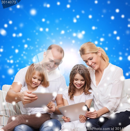 Image of happy family with tablet pc computers