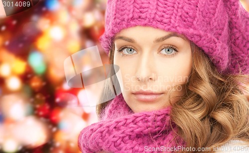 Image of close up of young woman in winter clothes