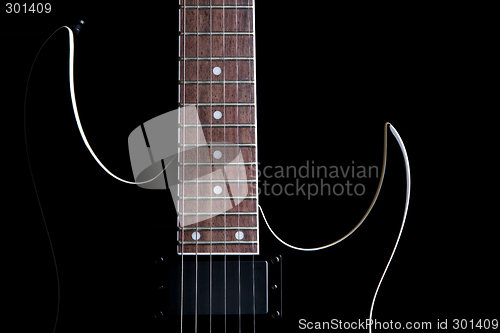 Image of electric guitar silhouette isolated on black