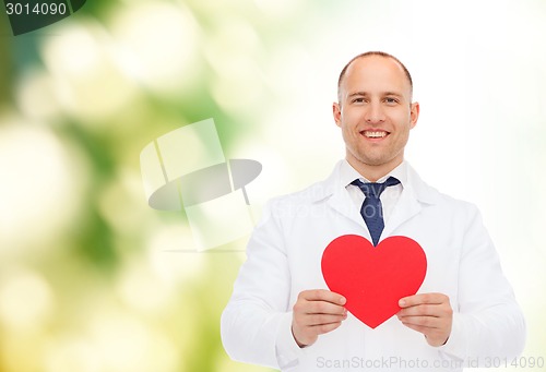 Image of smiling male doctor with red heart