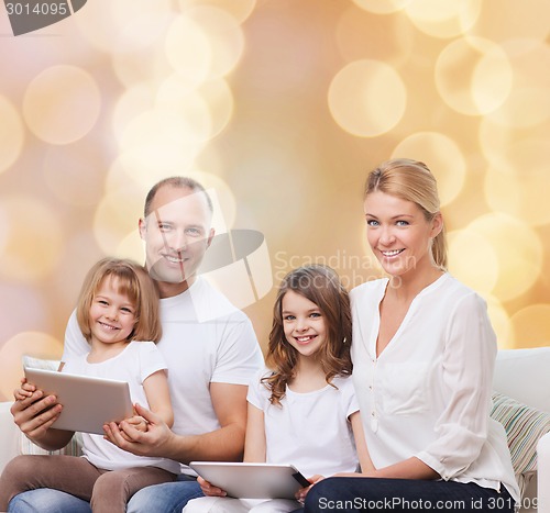 Image of happy family with tablet pc computers