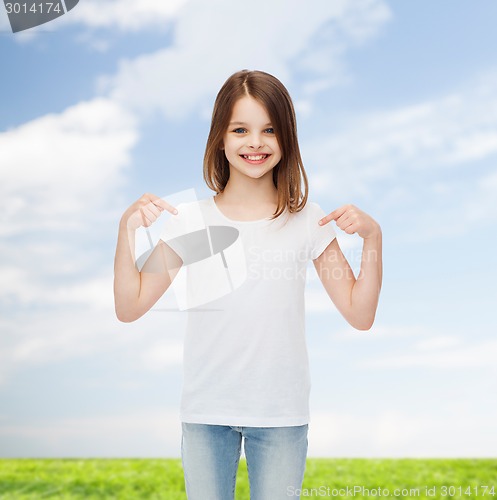 Image of smiling little girl in white blank t-shirt