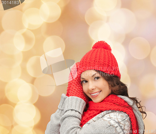 Image of smiling young woman in winter clothes