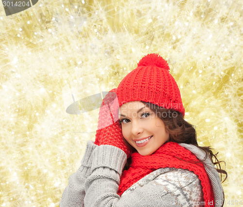 Image of smiling young woman in winter clothes