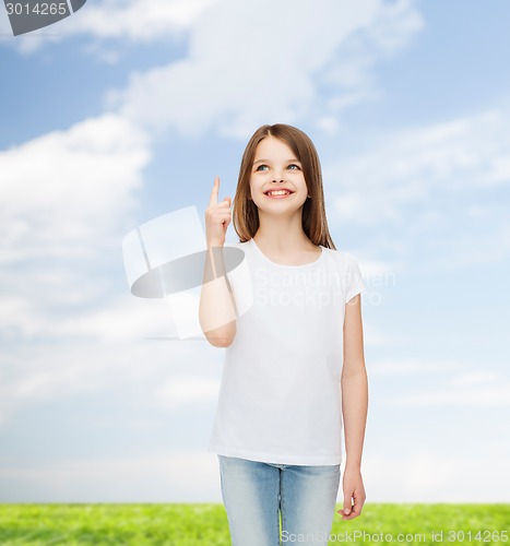 Image of smiling little girl in white blank t-shirt