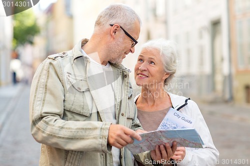 Image of senior couple on city street