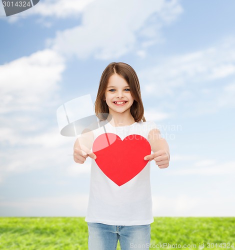 Image of smiling little girl in white blank t-shirt