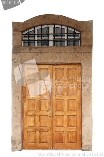 Image of wooden door with stone border