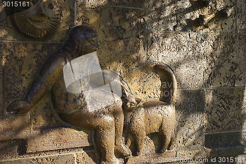 Image of Relief panel on a wall of a bus stop