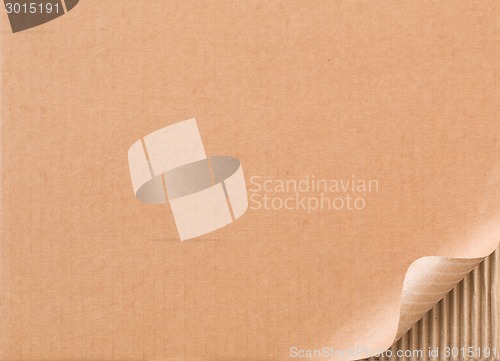 Image of Corrugated cardboard with curled corner
