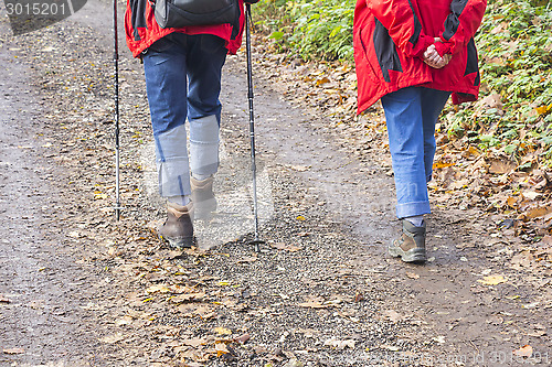 Image of Older couple hiking