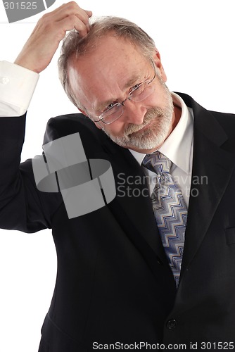 Image of Businessman head scratch