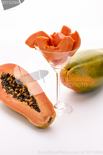 Image of Tangerine pulp and peppery seeds - the Papaya
