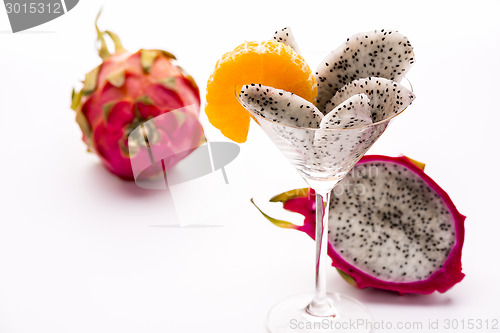 Image of Wedges of the dragon fruit in a glass
