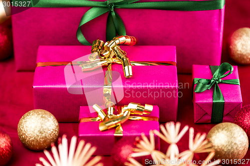 Image of Four Plain Christmas Presents in Magenta