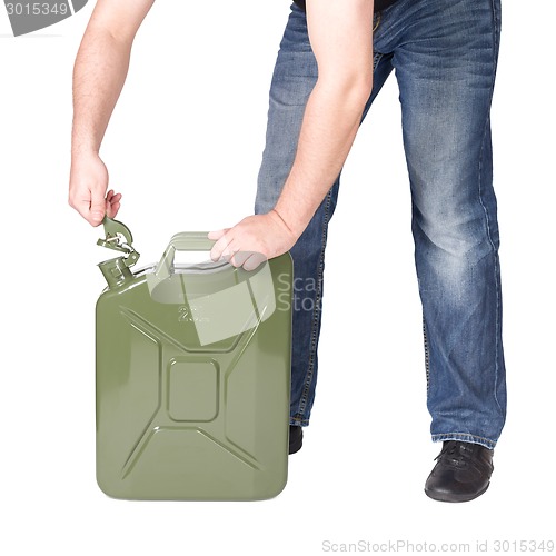 Image of Man opening jerry can. 