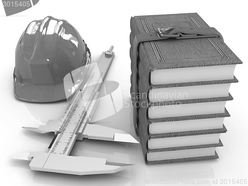 Image of Vernier caliper, leather books and yellow hard hat 