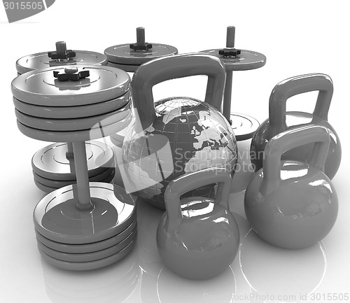 Image of Colorful weights and dumbbells and earth. Global 