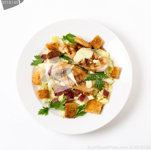 Image of Chicken caesar salad from above