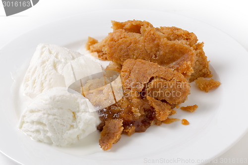 Image of Traditional lemon Sussex pond pudding  and ice cream