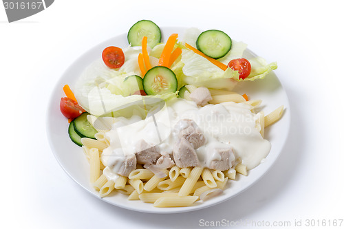 Image of Chicken and pasta with white sauce dinner