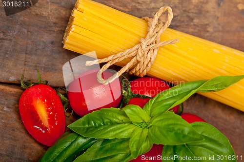 Image of Italian spaghetti pasta tomato and basil