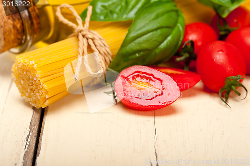 Image of Italian spaghetti pasta tomato and basil