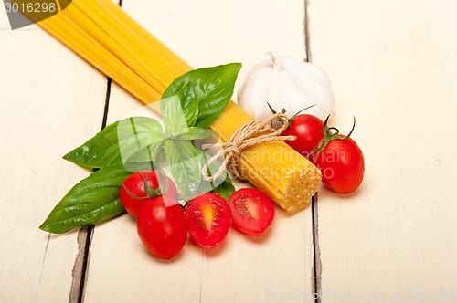 Image of Italian spaghetti pasta tomato and basil