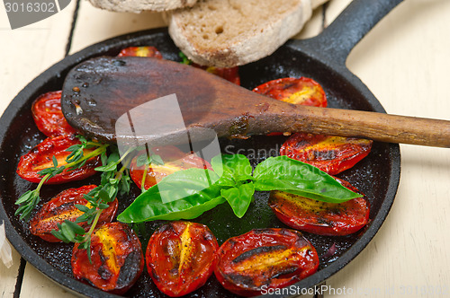 Image of baked cherry tomatoes with basil and thyme