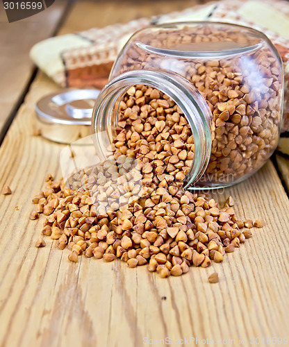 Image of Buckwheat in glass jar on board