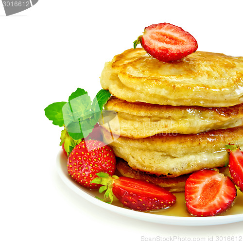 Image of Flapjacks with strawberries and mint