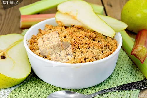 Image of Crumble with pears and rhubarb on board