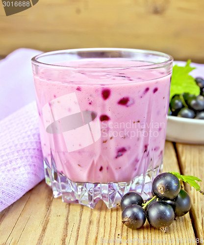 Image of Milkshake with black currants with napkin