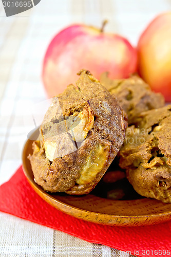 Image of Cupcake rye with apple on red paper napkin