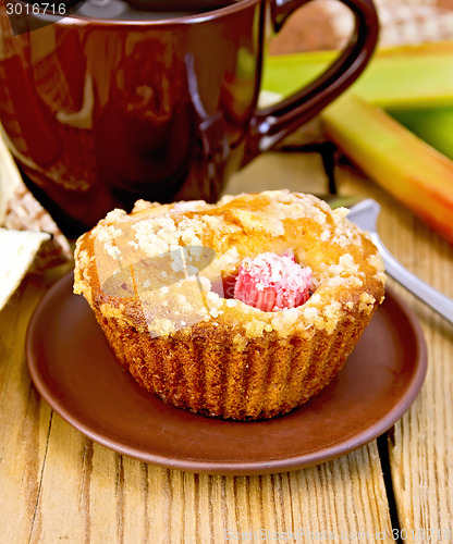 Image of Cupcakes with rhubarb and mug on board