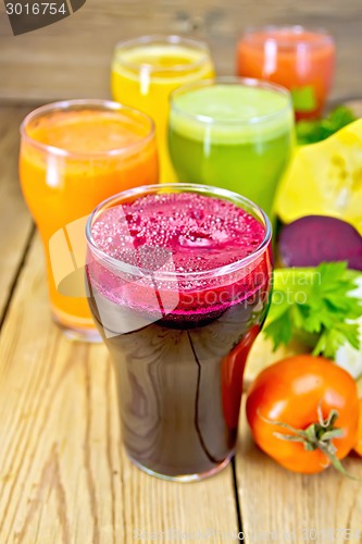 Image of Juice beet and vegetable with vegetables on table