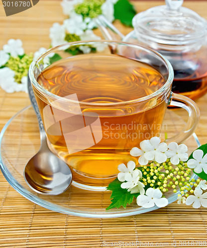 Image of Tea from flowers of viburnum on bamboo napkin