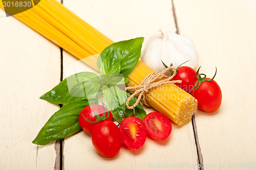 Image of Italian spaghetti pasta tomato and basil