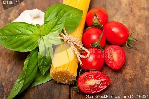 Image of Italian spaghetti pasta tomato and basil