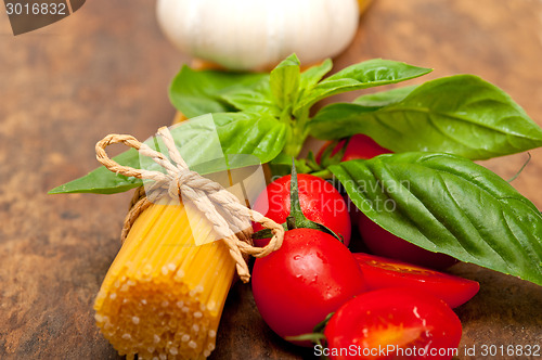 Image of Italian spaghetti pasta tomato and basil