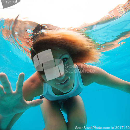 Image of Female with eyes open underwater