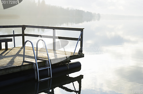 Image of summer landscape, lake and wooden jetty