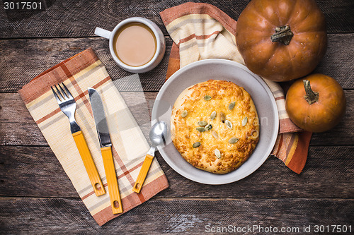 Image of Morning coffee with flatbread and pumpkins in rustic style