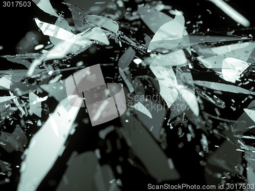 Image of Broken and destructed glass on black shallow DOF