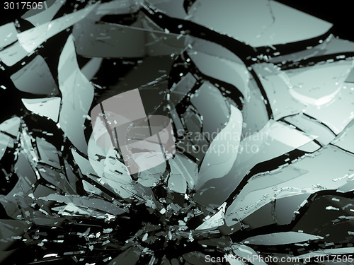 Image of Destructed or Shattered glass pieces on black shallow DOF
