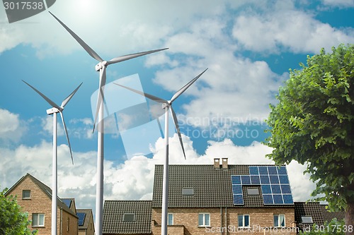 Image of New houses with solar panels and wind generators