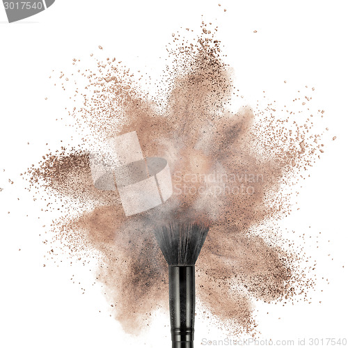 Image of White powder explosion isolated on black